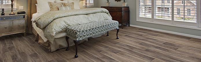 rustic luxury vinyl flooring in bedroom